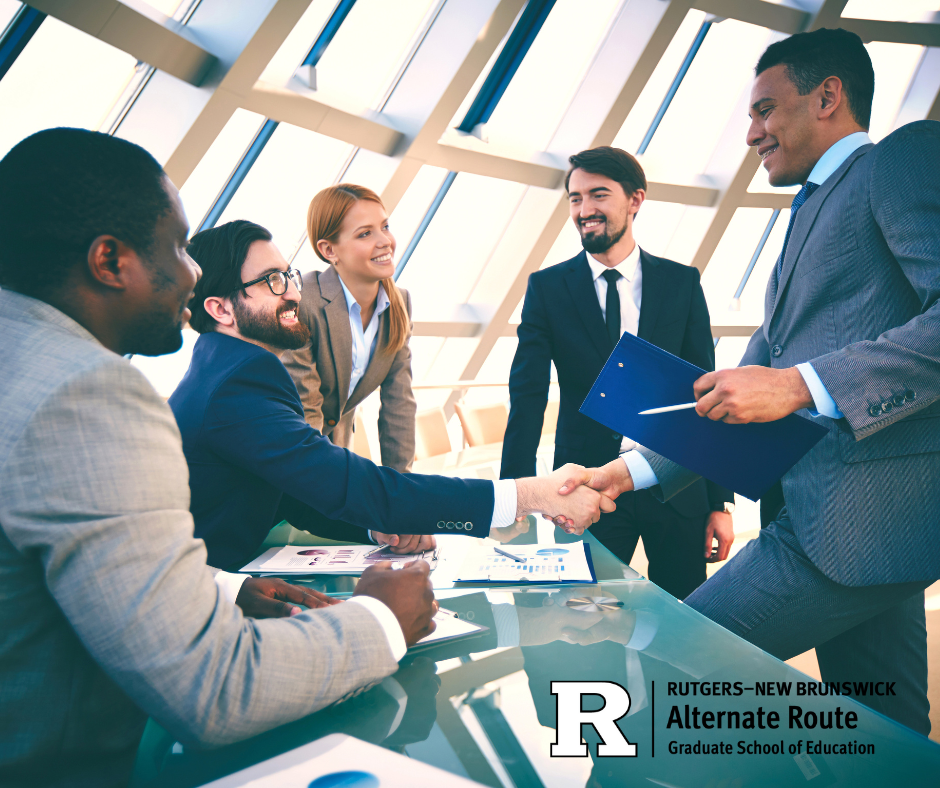 Group of businesspeople gathered around a conference table