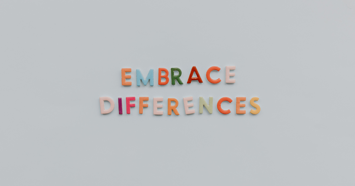 The words "EMBRACE DIFFERENCES" in various colors