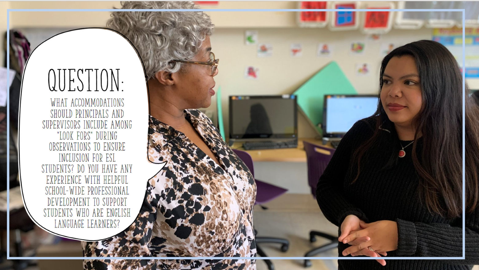 Two women speaking in a classroom