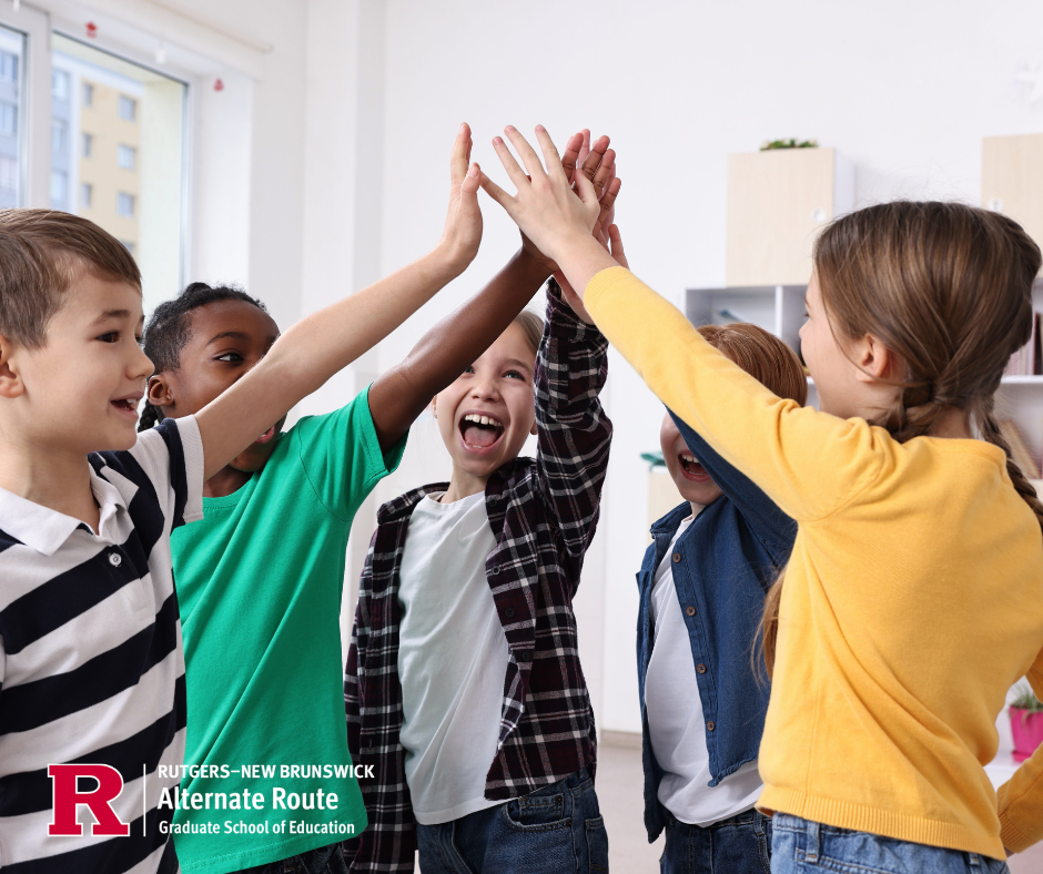 Elementary students gathered around high-fiving one another