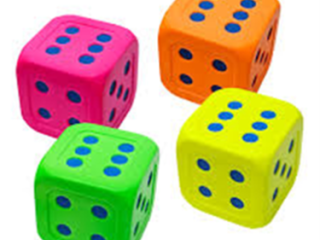 A set of four dice in neon colors