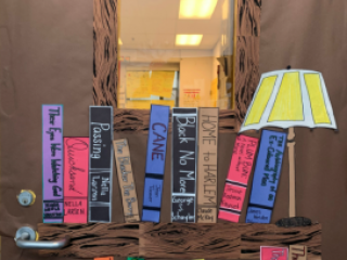 Image of bookshelves and books made out of construction paper