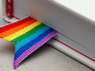 Book with a rainbow flag bookmark