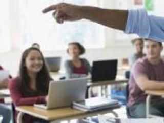 Teacher in front of classroom