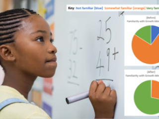 A female student stands in front of a white board, solving problems