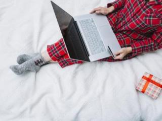 Person sitting with laptop