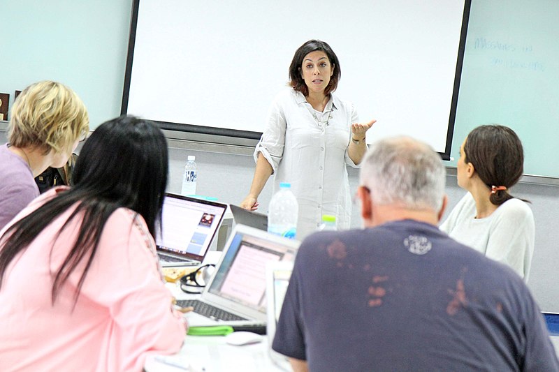 woman in front of classroom